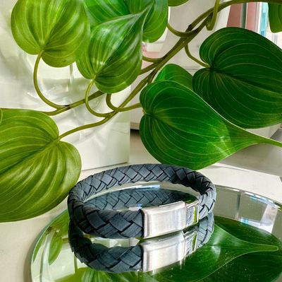 Intricately woven bracelet in antique blue