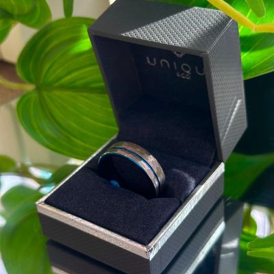 Hammered grey ring with blue line