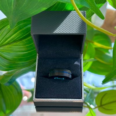 Black and blue court-shaped ring