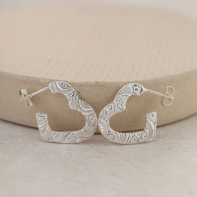 Textured cut out heart earrings
