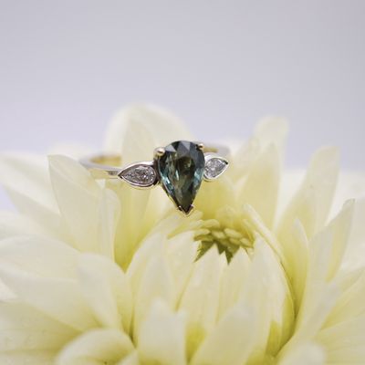Pear-shaped teal sapphire and diamond ring