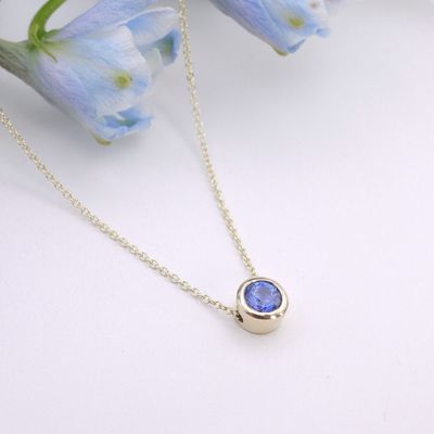 Sapphire floating pendant in gold