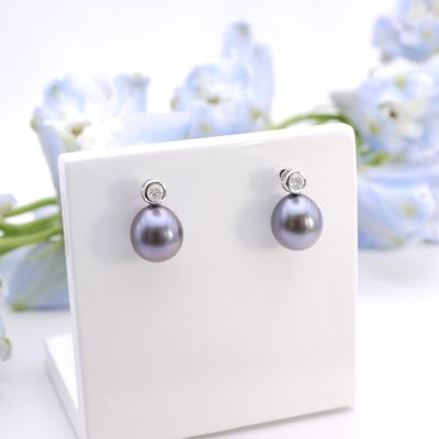 Pear-shaped peacock pearl studs with diamonds