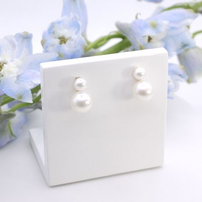 Double pearl drop studs in gold