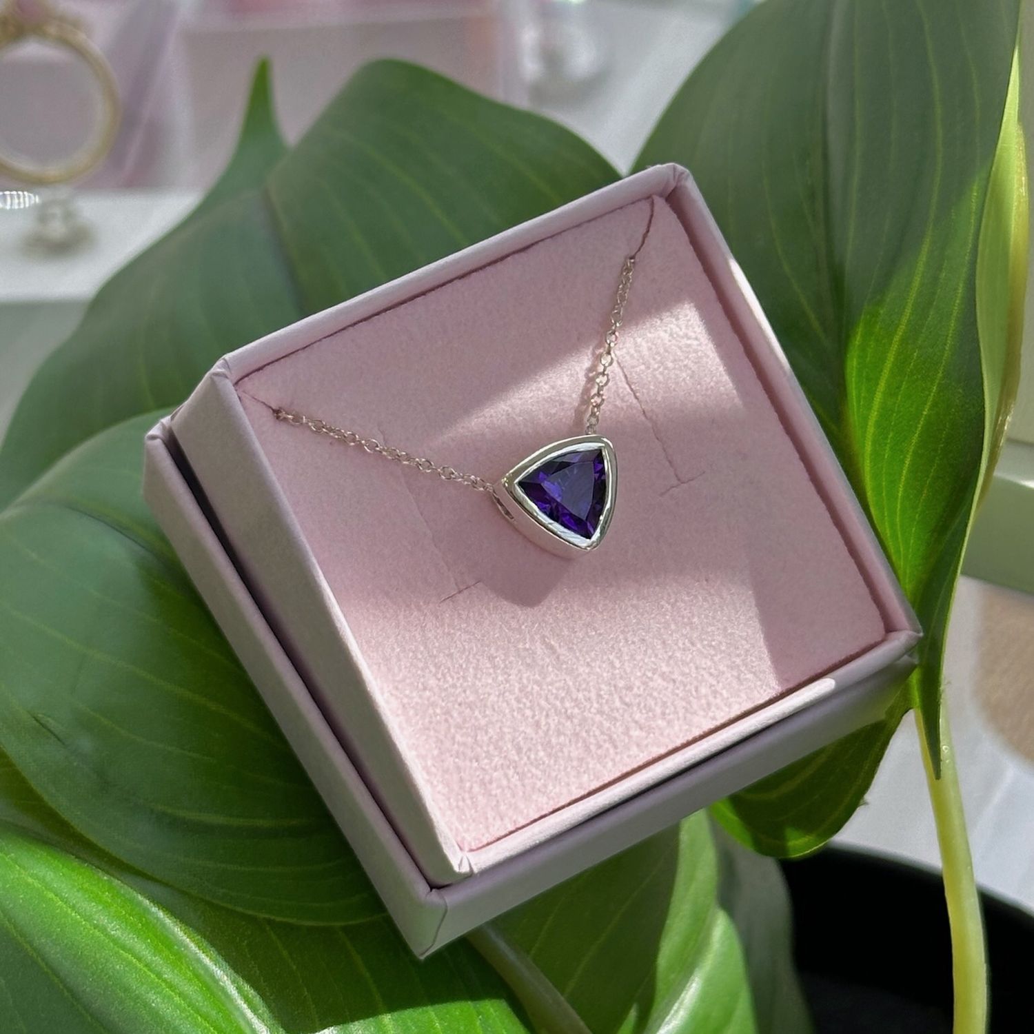Trillion-cut amethyst floating pendant in silver