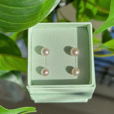 Round pearl studs with 9ct gold posts