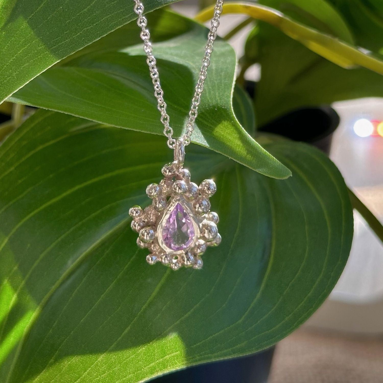 Pear-shaped amethyst &#39;nebula&#39; pendant
