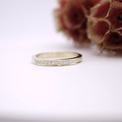 Diamond half eternity ring in gold