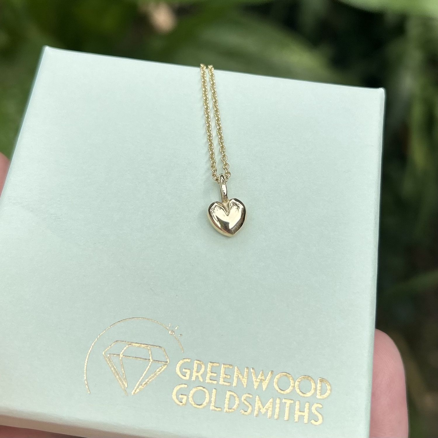 Puffed gold heart pendant