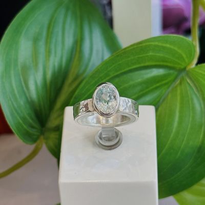 Blue zircon hammered ring