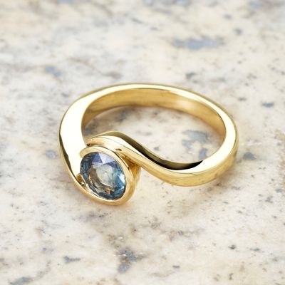 Teal sapphire wave ring