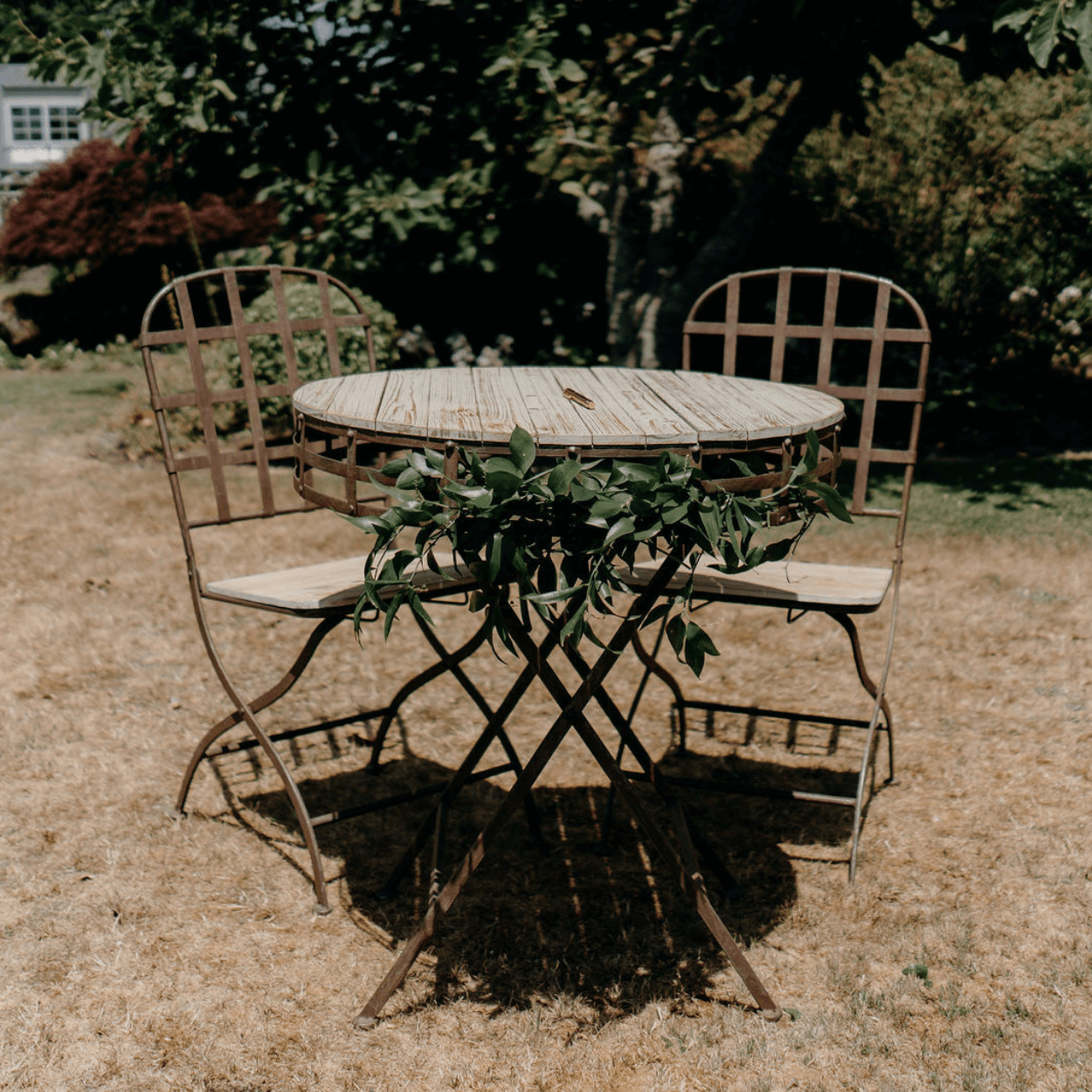 Registry table w 2 chairs; wood/wrought iron (rustic)