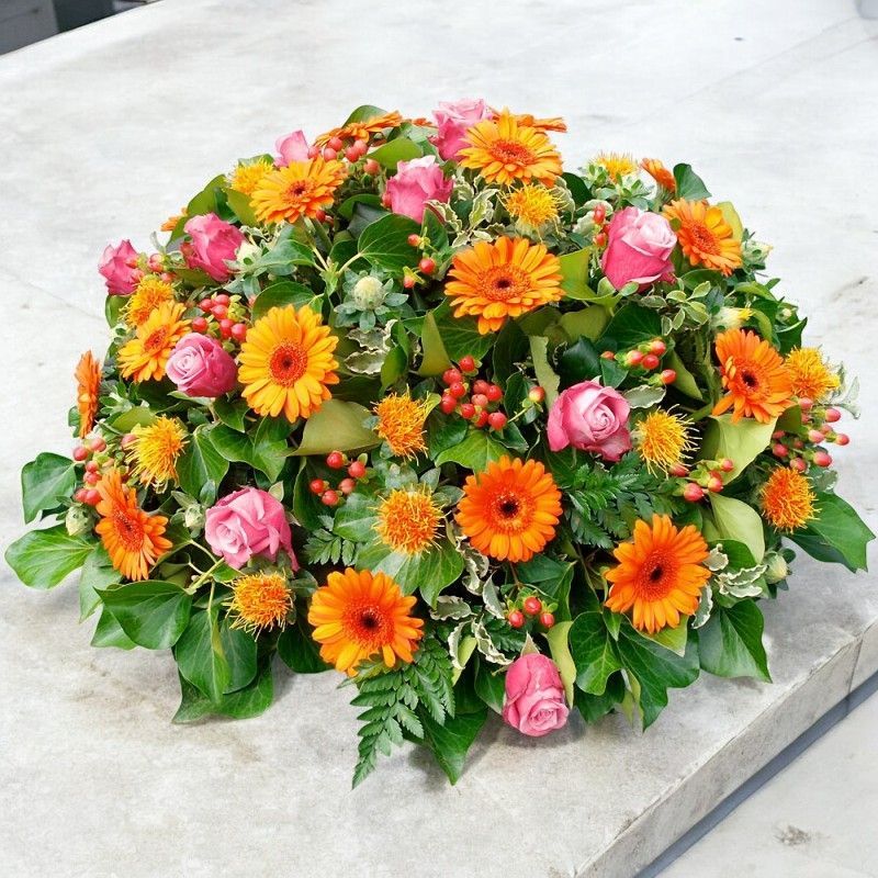 Coussin rose fuchsia et orange