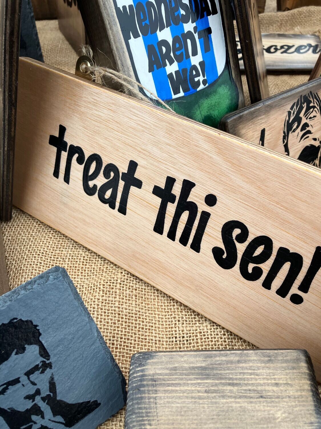 Treat Thi Sen Sign