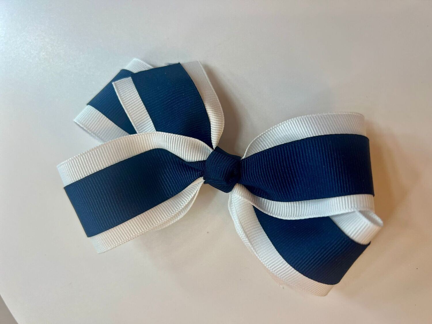 Gancho Doble Cinta $7