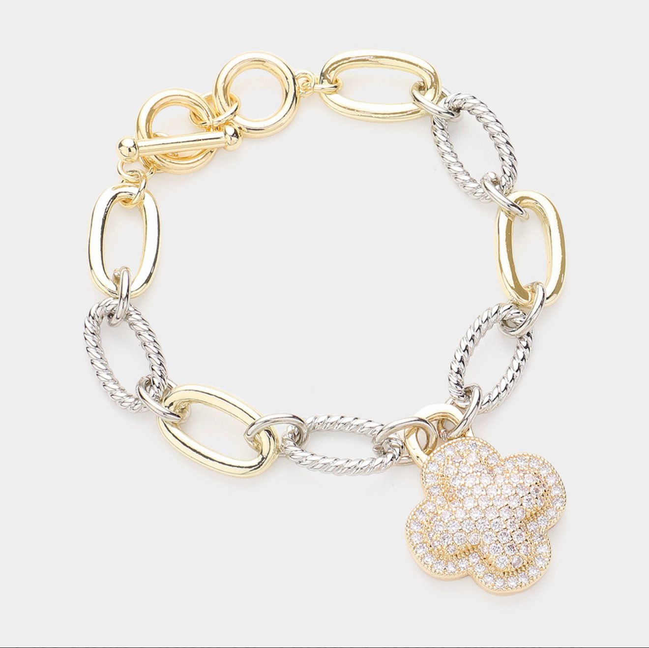 Stone Paved Quatrefoil Charm Textured Metal Toggle Bracelet