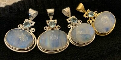 Moonstone w/ Blue Topaz Pendants Moonstone w/ Blue Topaz Pendants