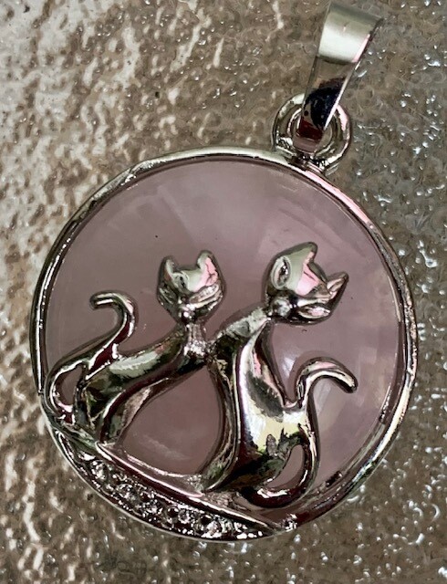 Rose quartz pendants with two cats