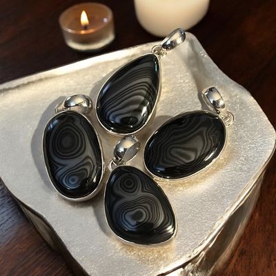 The Magic Gemstone Psilomelane - Scry by looking into the nature made design of the pendant