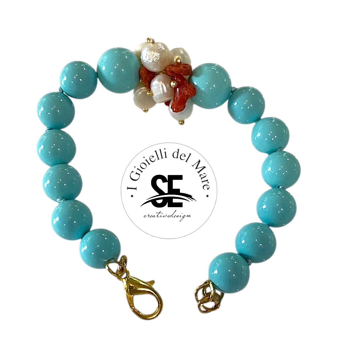 Bracciale in pasta di turchese con perle di acqua dolce e corallo rosso in argento 925