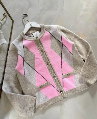 Pink-beige knit cardigan with gold buttons