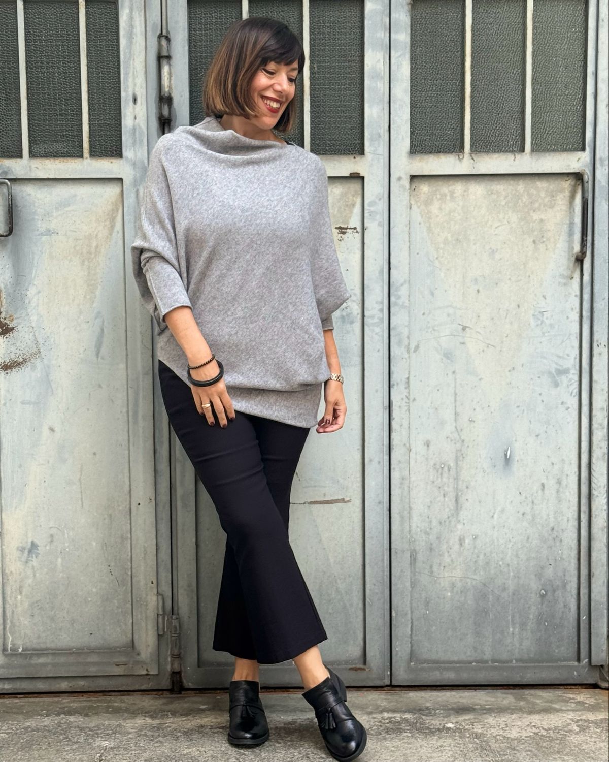 Maglione taglio asimmetrico grigio melange