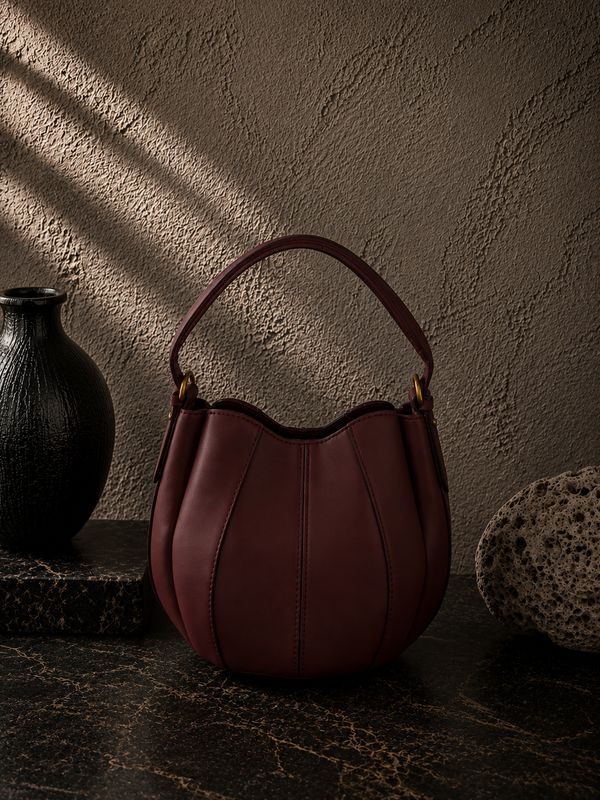 Borsa conchiglia pelle