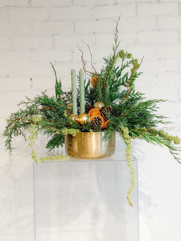 Evergreen Essence Christmas centrepiece with fresh greenery, candles and dried oranges by Teresa James Floral