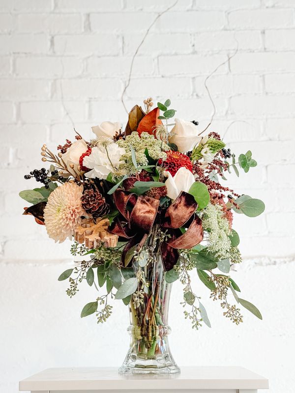Hearth &amp; Home rustic seasonal floral centrepiece with cream flowers, copper accents and greenery