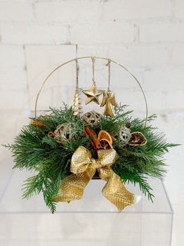 Golden Glow Christmas hoop arrangement with fresh evergreen greenery, gold ornaments and festive gold ribbon