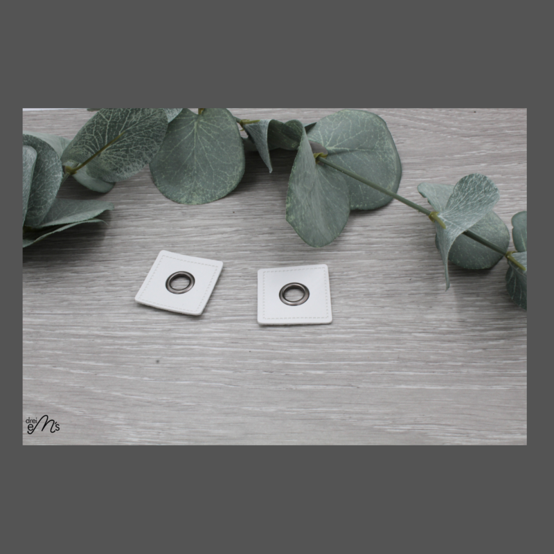 2 Stk Ösen Nickel auf Kunstleder weiss 2 Stk Ösen Nickel auf Kunstleder weiss