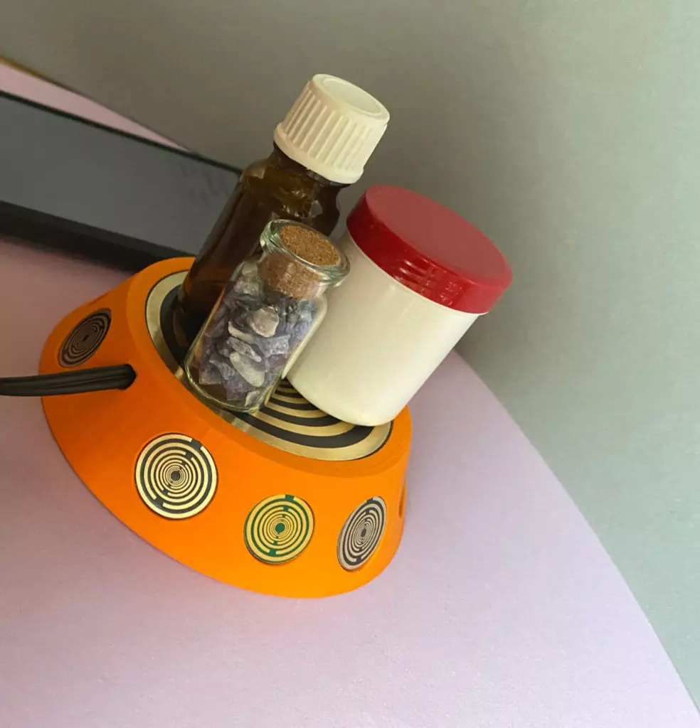 69 mm VibraNex UFO - orange, Oberflächenplatte Gold legiert, Füllung Bergkristall & Turmalin