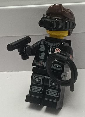 NELA-f, Espía Minifigura de LEGO.