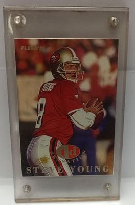 NELA-q, Una tarjeta de fútbol americano de 1995 Fleer TD Sensations #10 de Steve Young de los San Francisco 49ers.