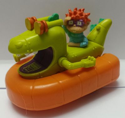 NELA-q, Carlitos Baldosa (Chuckie Finster),  Rugrats: Aventuras en pañales.