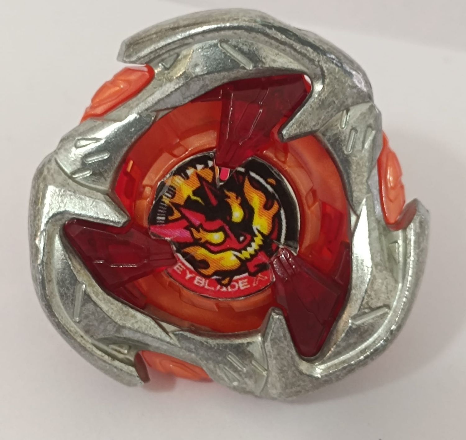 SHB-4k Beyblade Anaranjado Beyblade X Hells Hammer 3-70H fabricado por Takara Tomy.