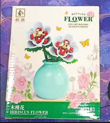 KM Mini Flores armables tipo lego. hibisco Incluyen en Jarron