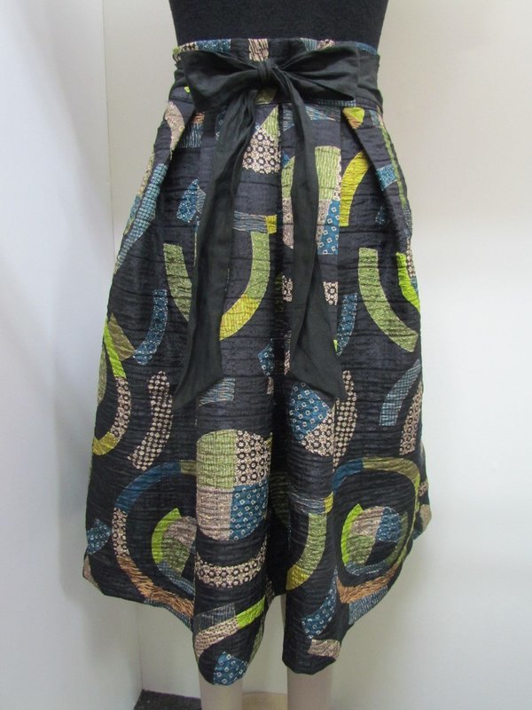 Green multi pleat skirt