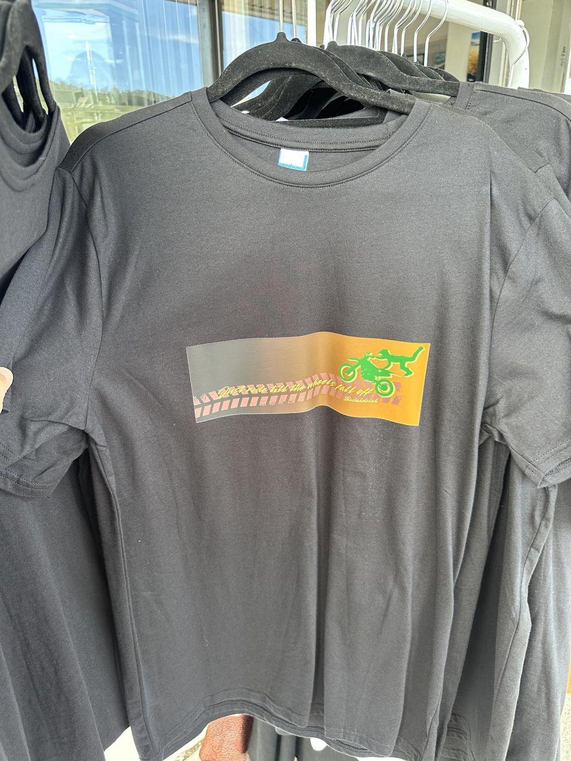 &#39;Just ride till the wheels fall off&#39; Black T-shirt