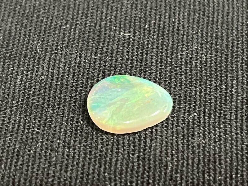 Crystal opal tear drop with green and teal colours