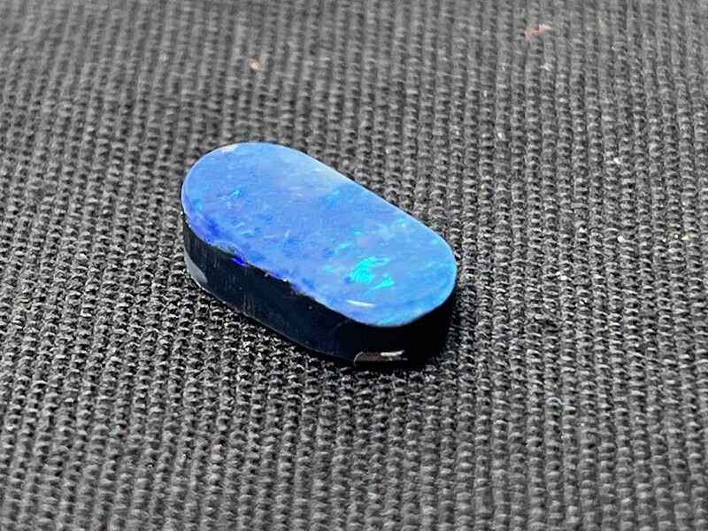 Black opal with blue and green