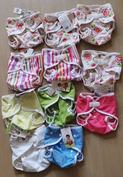 ​YEAR-END SALES. Thirsties Duo Pocket Diapers. Lot of 11 diapers ONLY. Mix &amp; Match. Boy/Girl set. BUY IT NOW WHILE STOCK LAST. FREE 2x Babycubes 1oz &amp; 2oz.