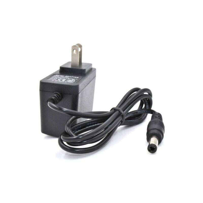 Adaptador De Corriente 9v color Negro marca Purple Turtle