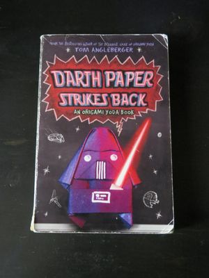 The cover of Darth Paper Strikes Back (An Origami Yoda Book) by Tom Angelberger.