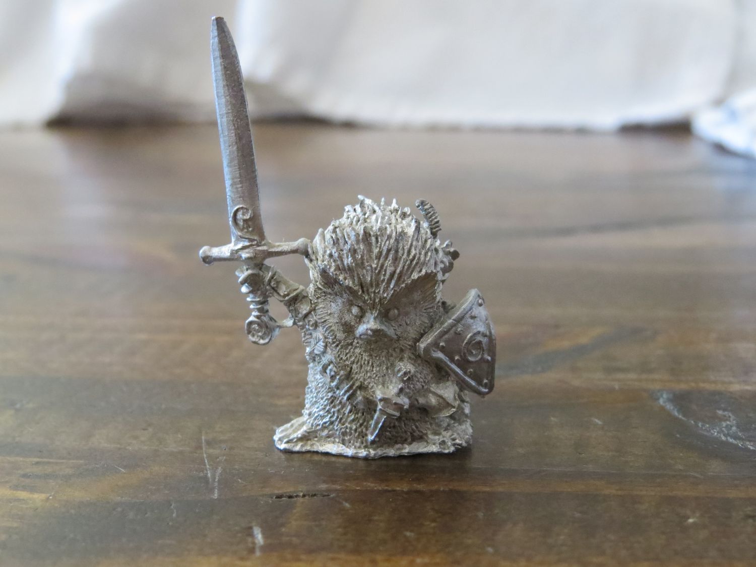 Unpainted Miniature of a Critter Warrior, front view.