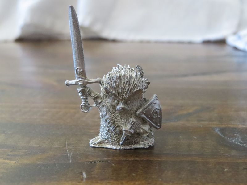Unpainted Miniature of a Critter Warrior, front view.