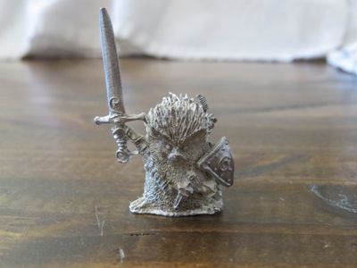 Unpainted Miniature of a Critter Warrior, front view.