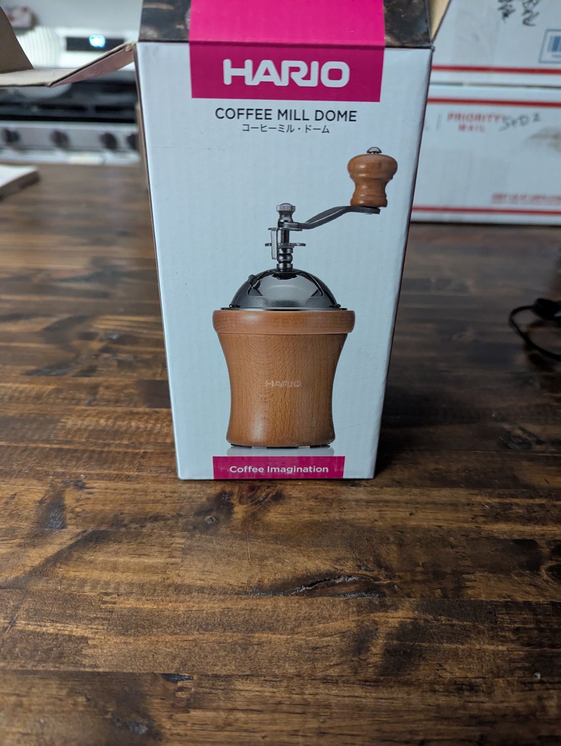 Box for the coffee mill in the listing.