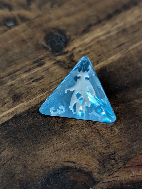 Icy blue translucent d4 with a pirate ghost for the 4.