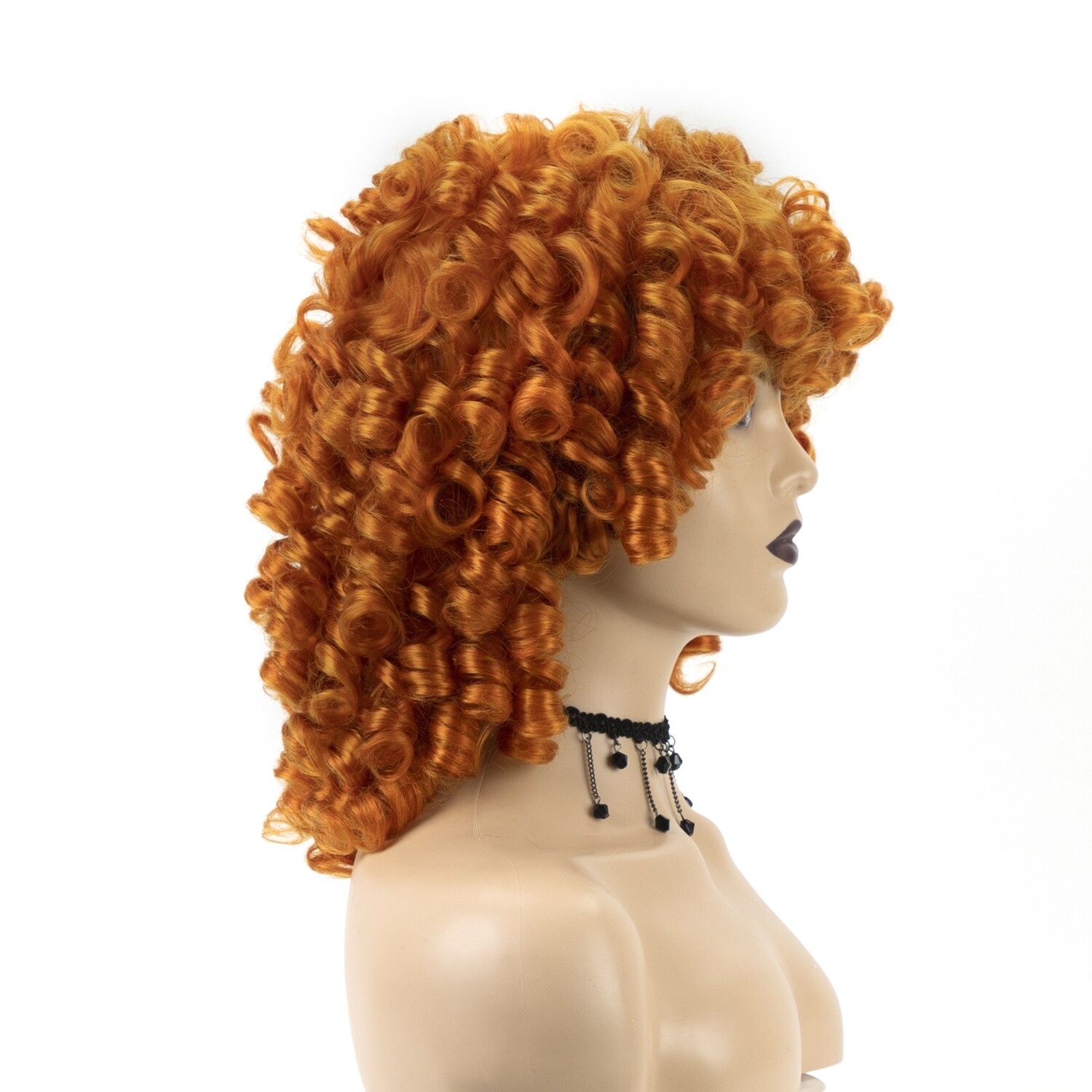 Short synthetic afro wig with a high quality elastic net in a vibrant orange or a deep red wine hue.